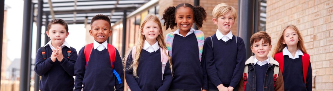 Group of school children coming out of school